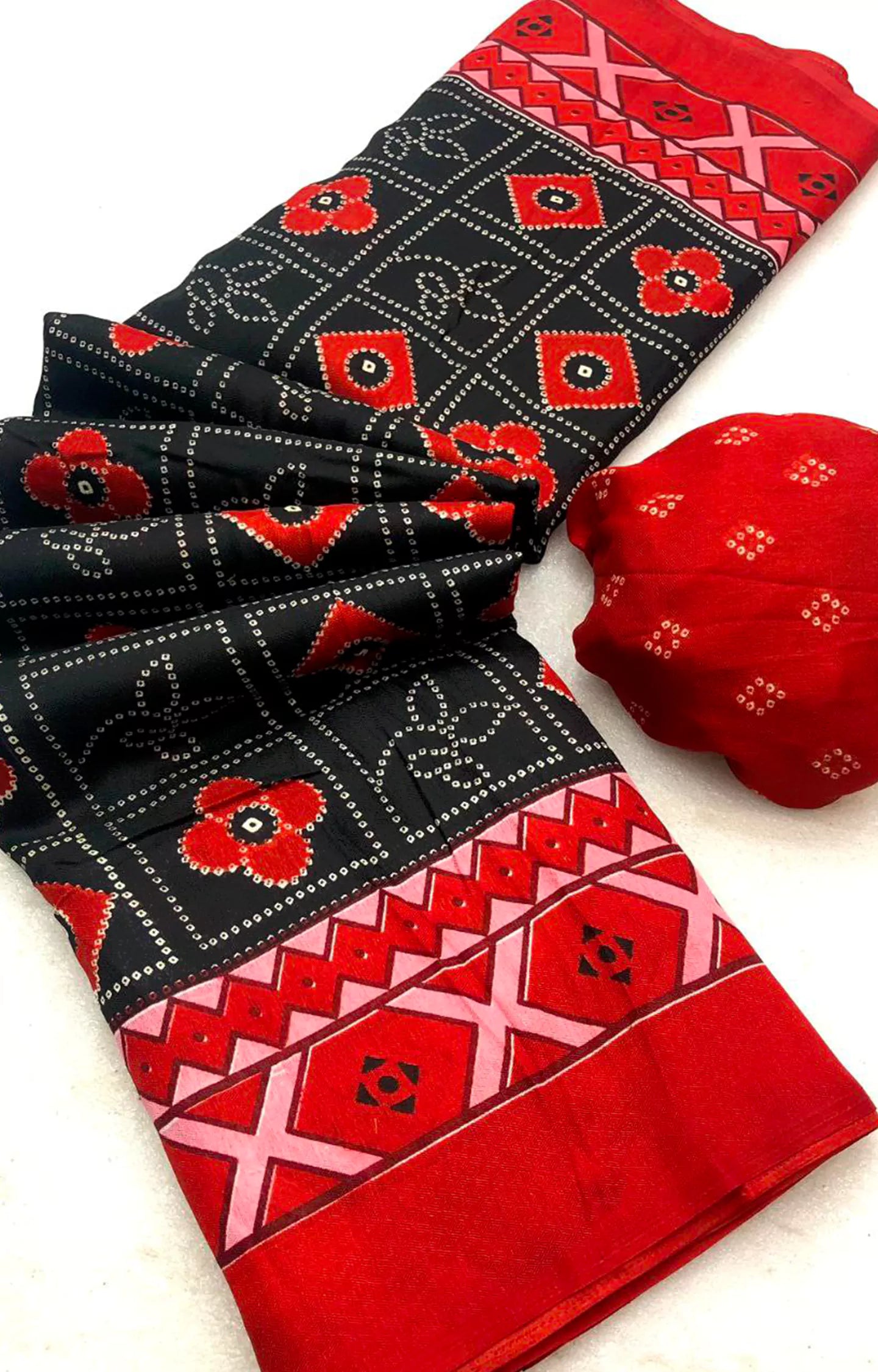 NAZUMI CHIFFON BLACK WITH RED BANDHNI DESIGNING SAREE