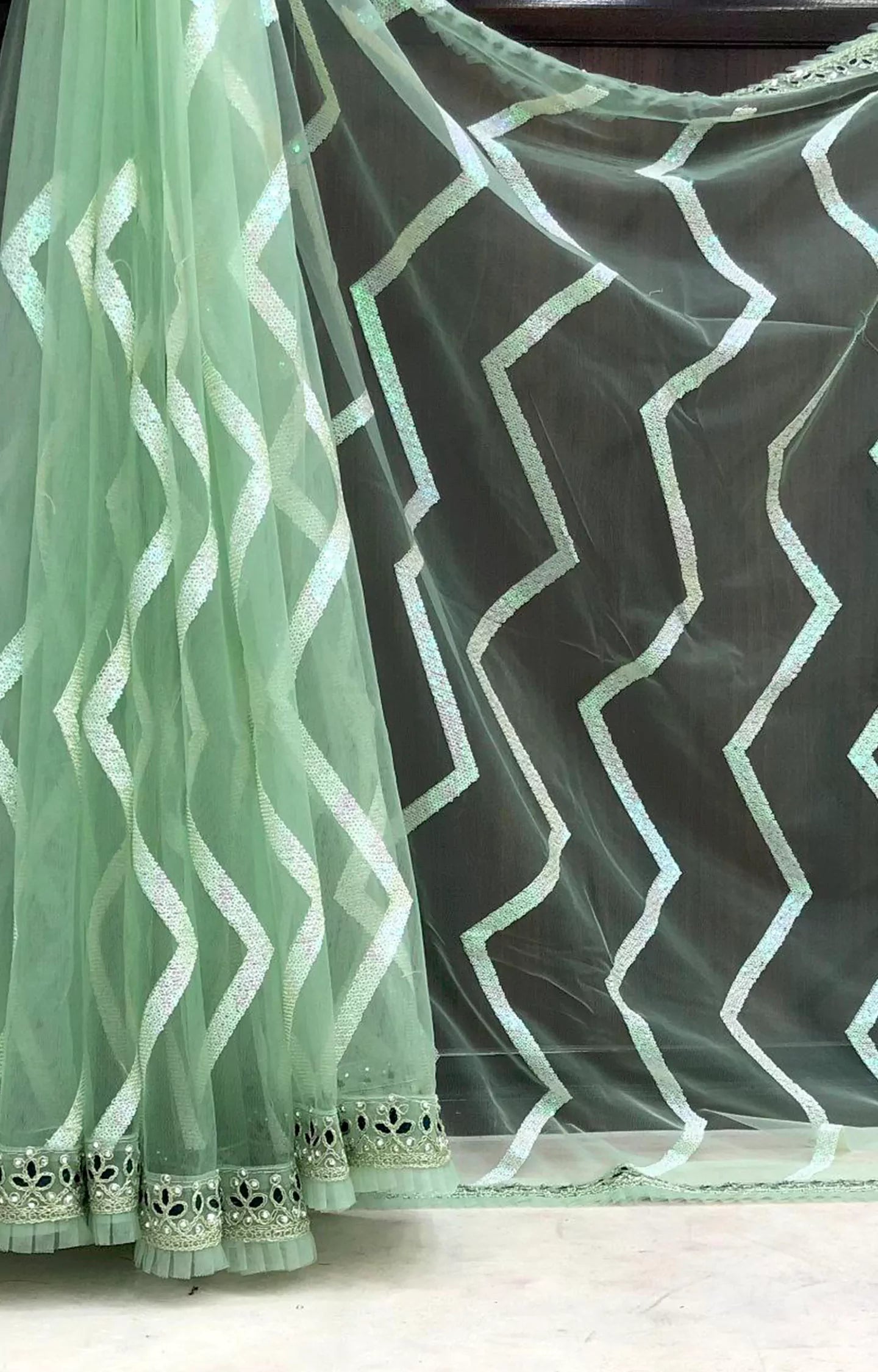 TUFIYA MONO NET FABRIC WITH ZIGZAG SEQUENCE WORK SAREE.