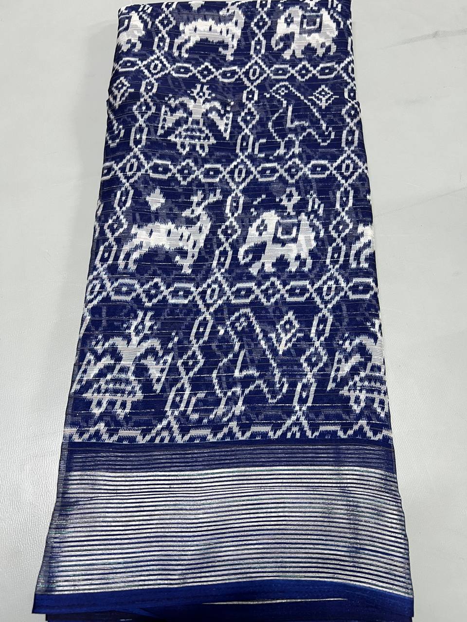 Soft Linen Printed, Furr & Foil Work Sarees with Blouse