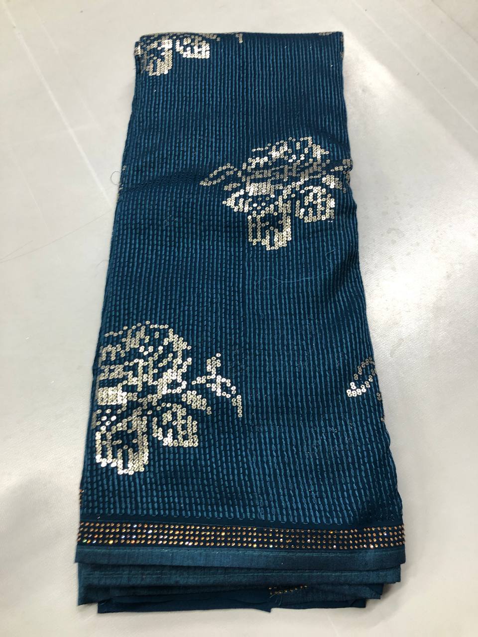 Soft Linen Printed, Furr & Foil Work Sarees with Blouse