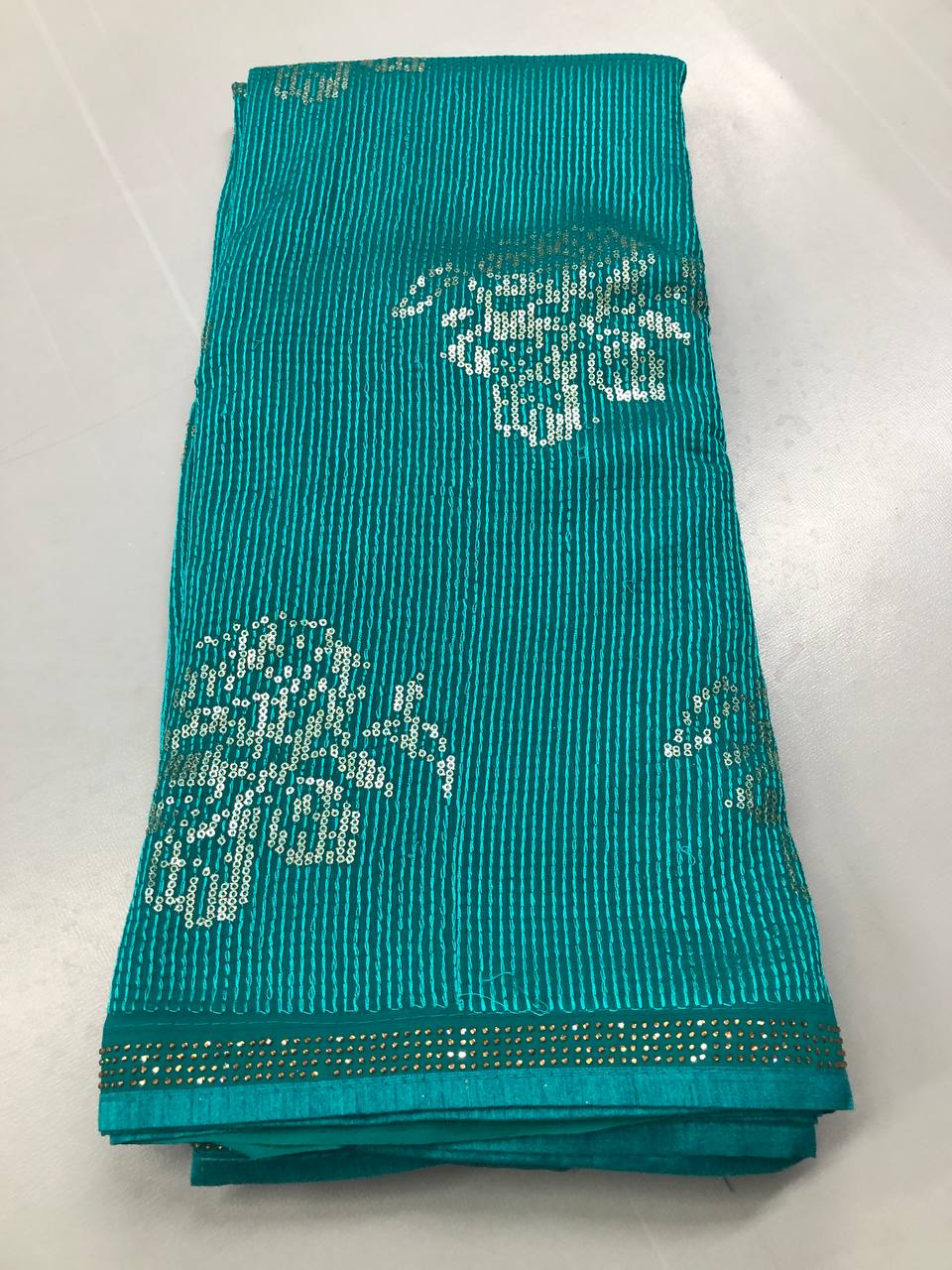 Soft Linen Printed, Furr & Foil Work Sarees with Blouse
